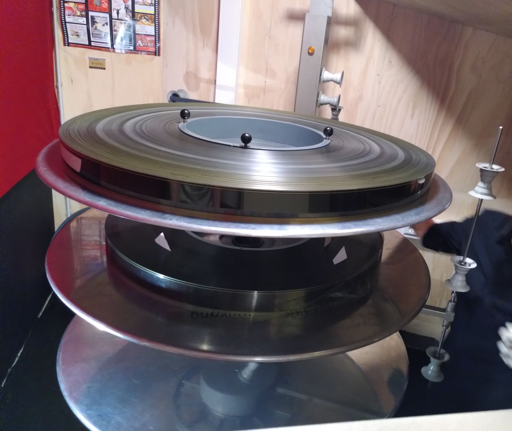 Photo of the 70mm films, on some kind of disc-like shelf.