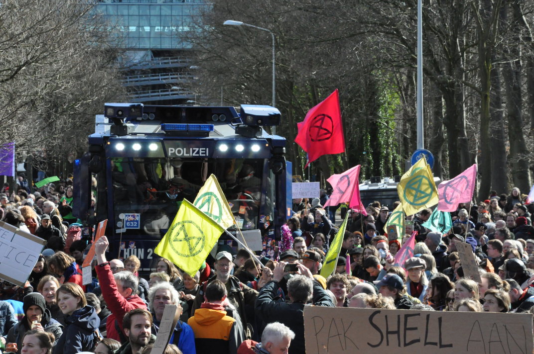 Extinction Rebellion protesters in front of a water cannon at the A12 blockade, March the 11th 2023